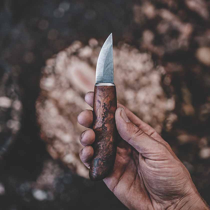 Roselli handmade small bear claw knife in UHC steel made in Finland, with a curly birch handle