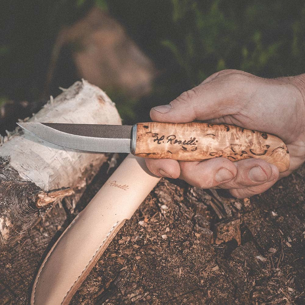 Handmade Finnish knife from Roselli in model "carpenter knife" with a handle made out of curly birch