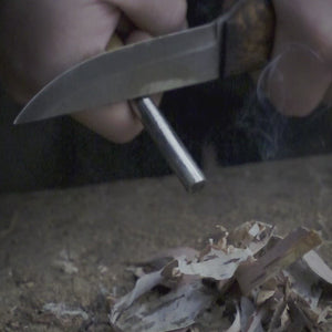 Video of handmade Finnish bushcraft knife from Roselli starting fire with Roselli fire steel  