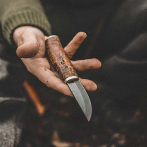 Handmade Finnish knife from Roselli  in model "carpenter knife" comes with a handle made out of heat treated curly birch and details of silver ferrule