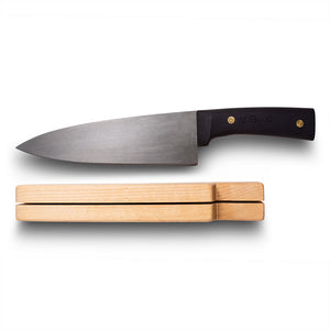 Handmade Finnish kitchen knife in model "Chef knife" comes with a handle made out of silicon comes with a knife rack made out of curly birch